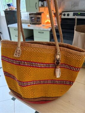 Handwoven Yellow Striped Tote Bag with Shell Charm
